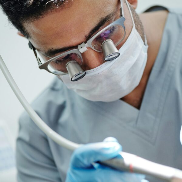 image of a dental surgeon doing dental implants in london