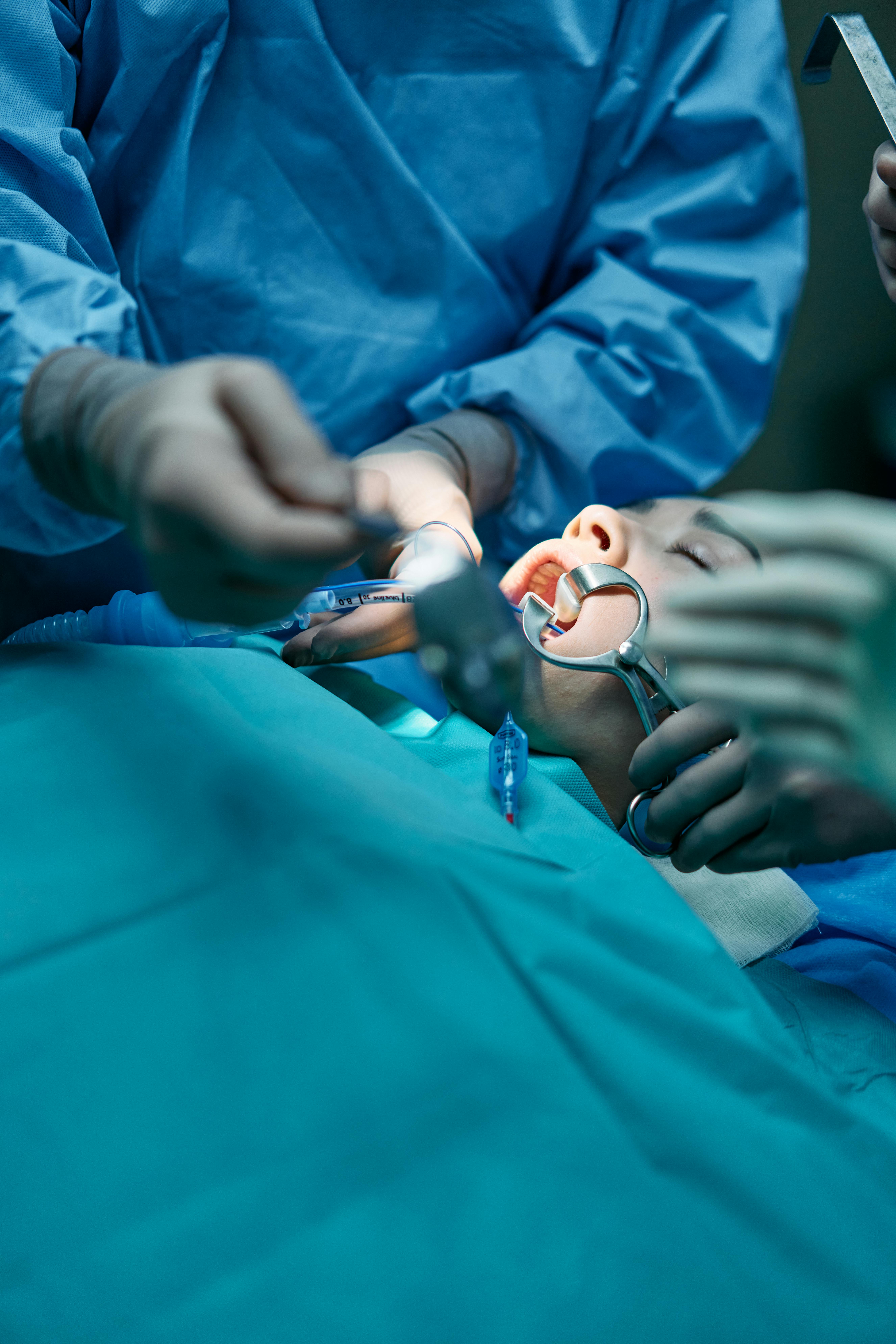 image of a private dentist, london, performing oral surgery on a patient