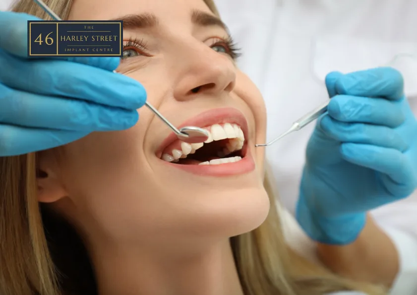 Woman having teeth cleaned