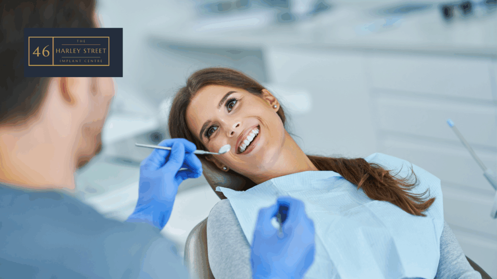 Patient looking at dentist smiling during treatment at a dental clinic setting